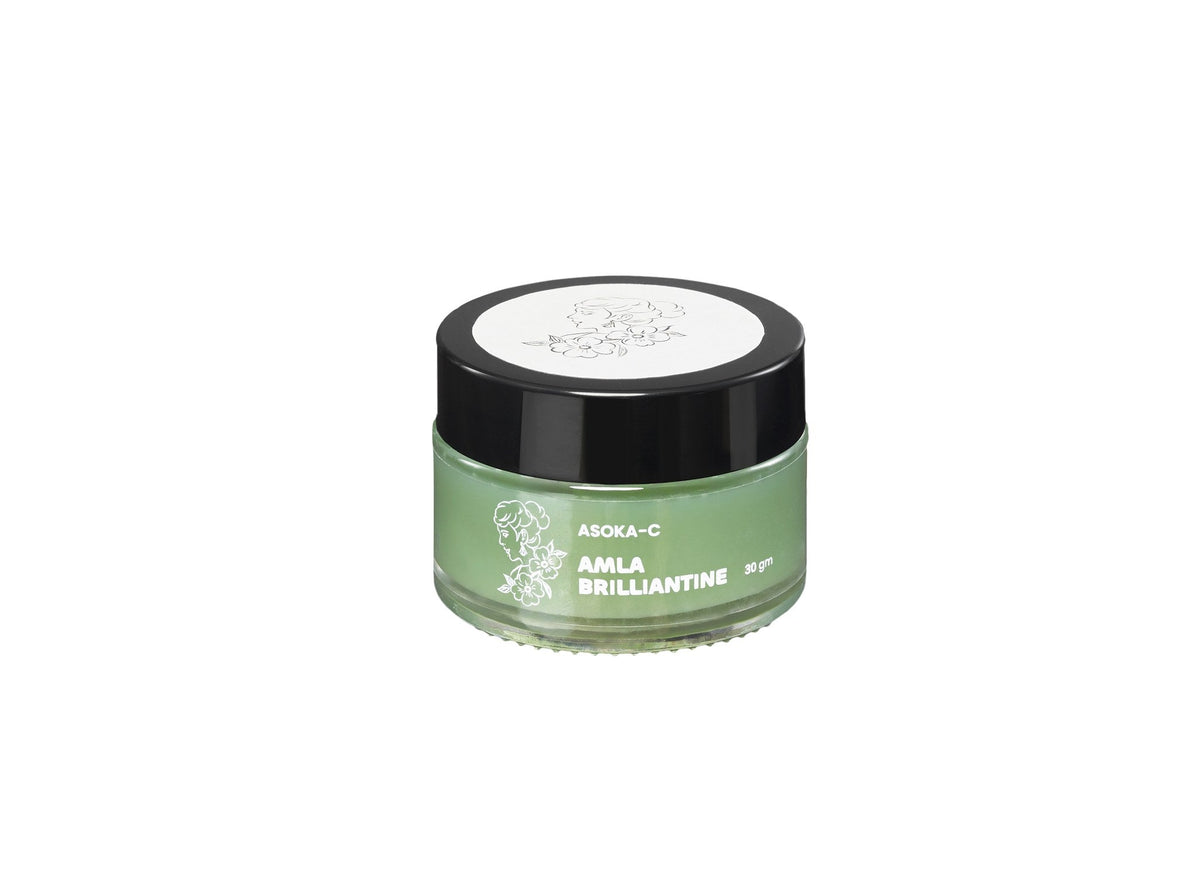 Asoka-C Amla Brilliantine 30 gm green glass jar with black lid, angled front view